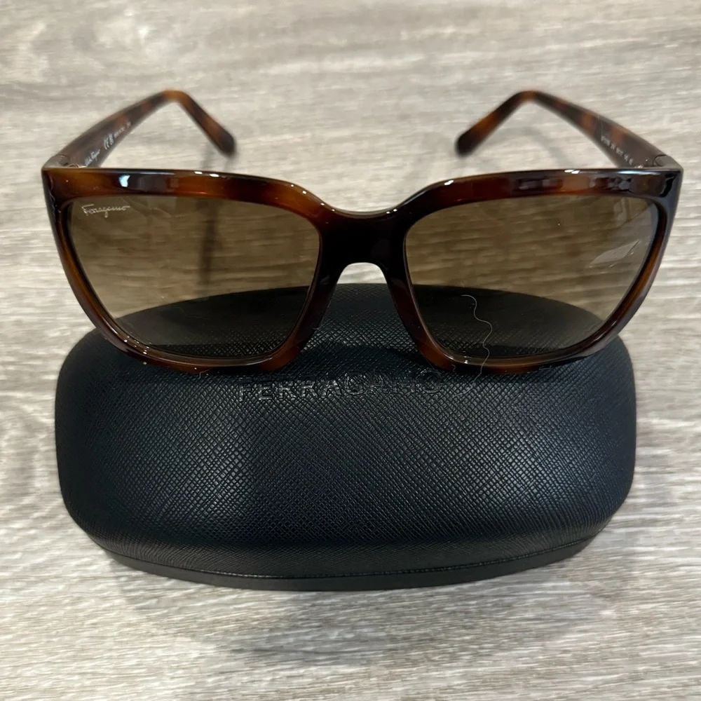 Salvatore Ferragamo Tortoise Sunglasses with SF Logo at Temples.
